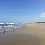 House In Near Dunes And