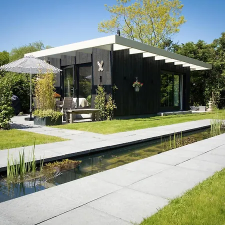 House In Near Dunes And *